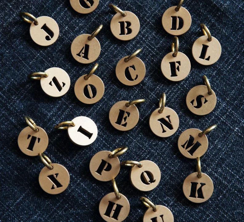 LETTER BRASS CHARM
